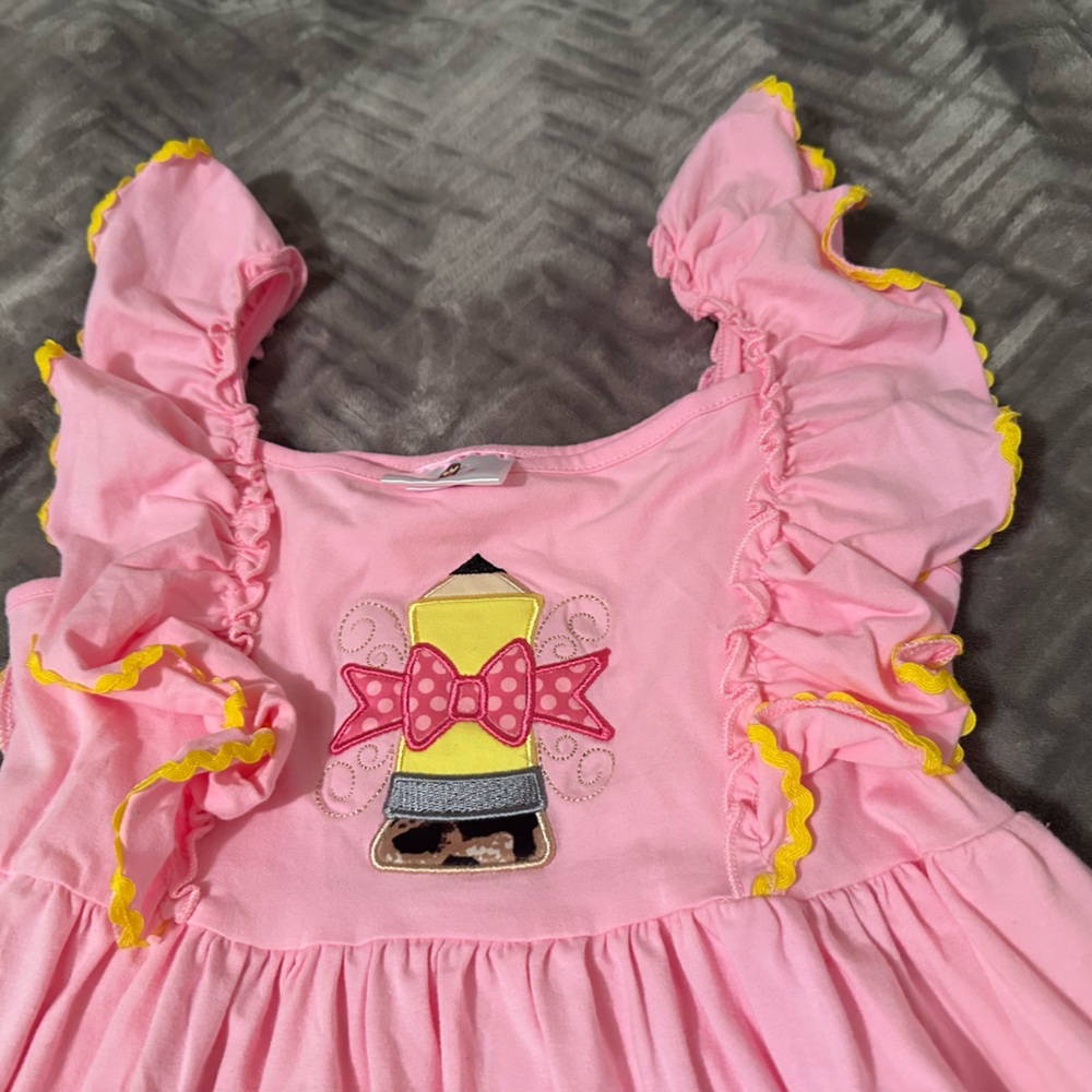 Pink Ruffle Dress with Yellow Accents